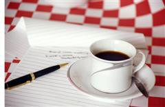 Coffee Cup and Notebook