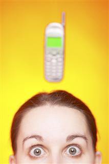 Surprised Face with Telephone