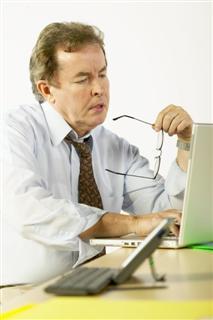 Man looking at computer screen