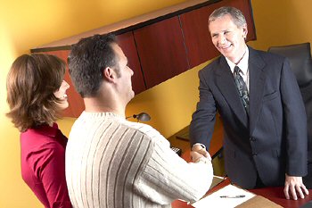 Businessman with Two Clients
