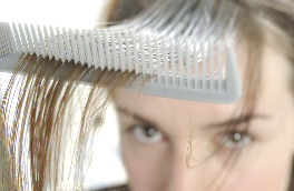 Girl Combing Hair