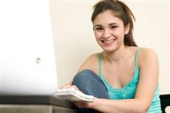 Girl Typing on Computer