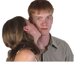 Girl Kissing Boy on Cheek