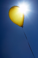 yellow balloon in the sunshine