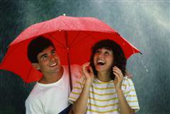 Man and Woman under Umbrella